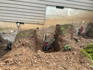 Helical piles foundation repair service basement repairs